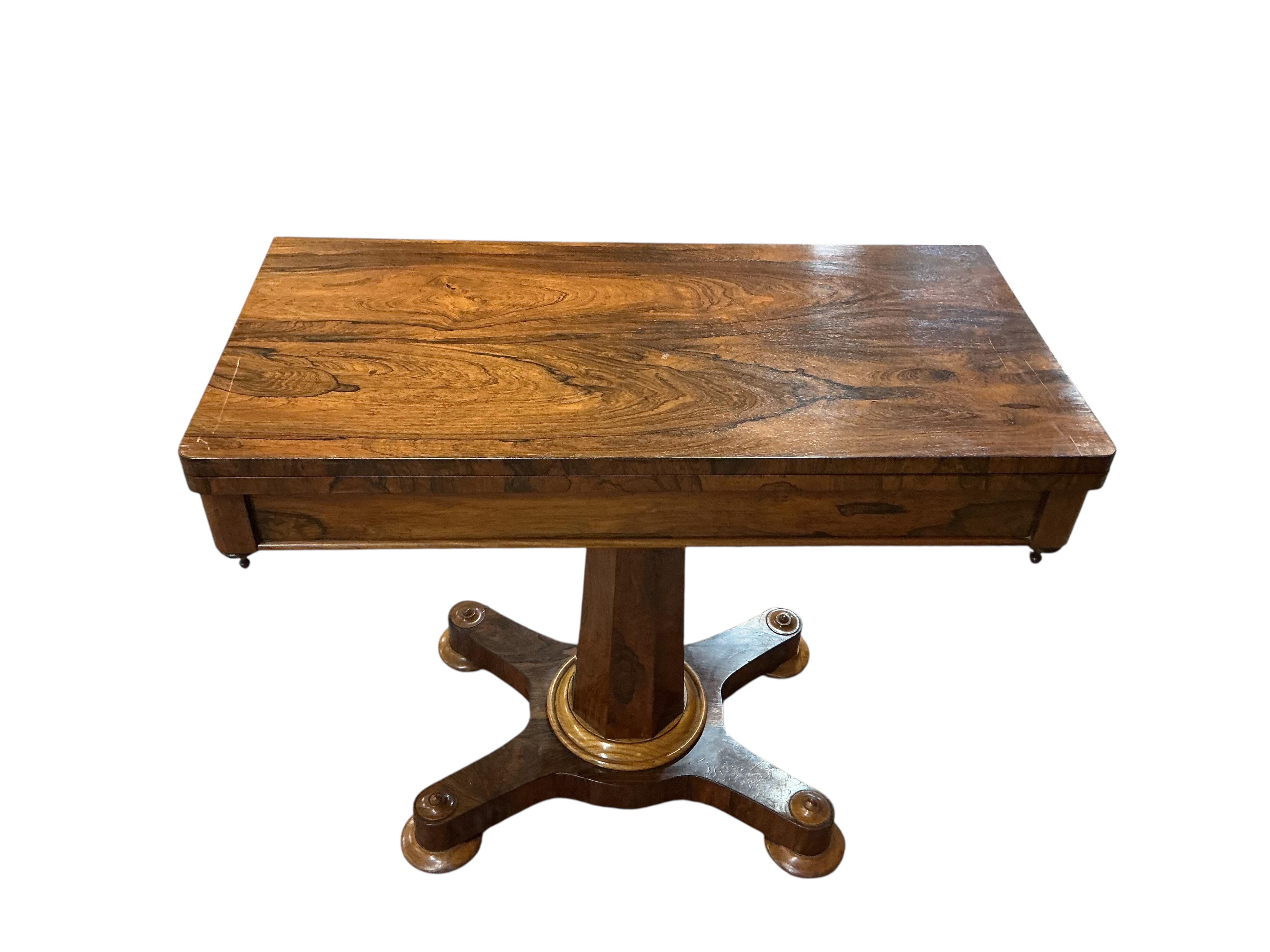 An early Victorian rectangular rosewood folding card table, width 91cm, depth 45cm, height 77cm